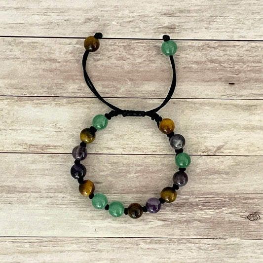 Vue de dessus du bracelet enfant calme et concentration, pierres naturelles Oeil de Tigre Aventurine Améthyste