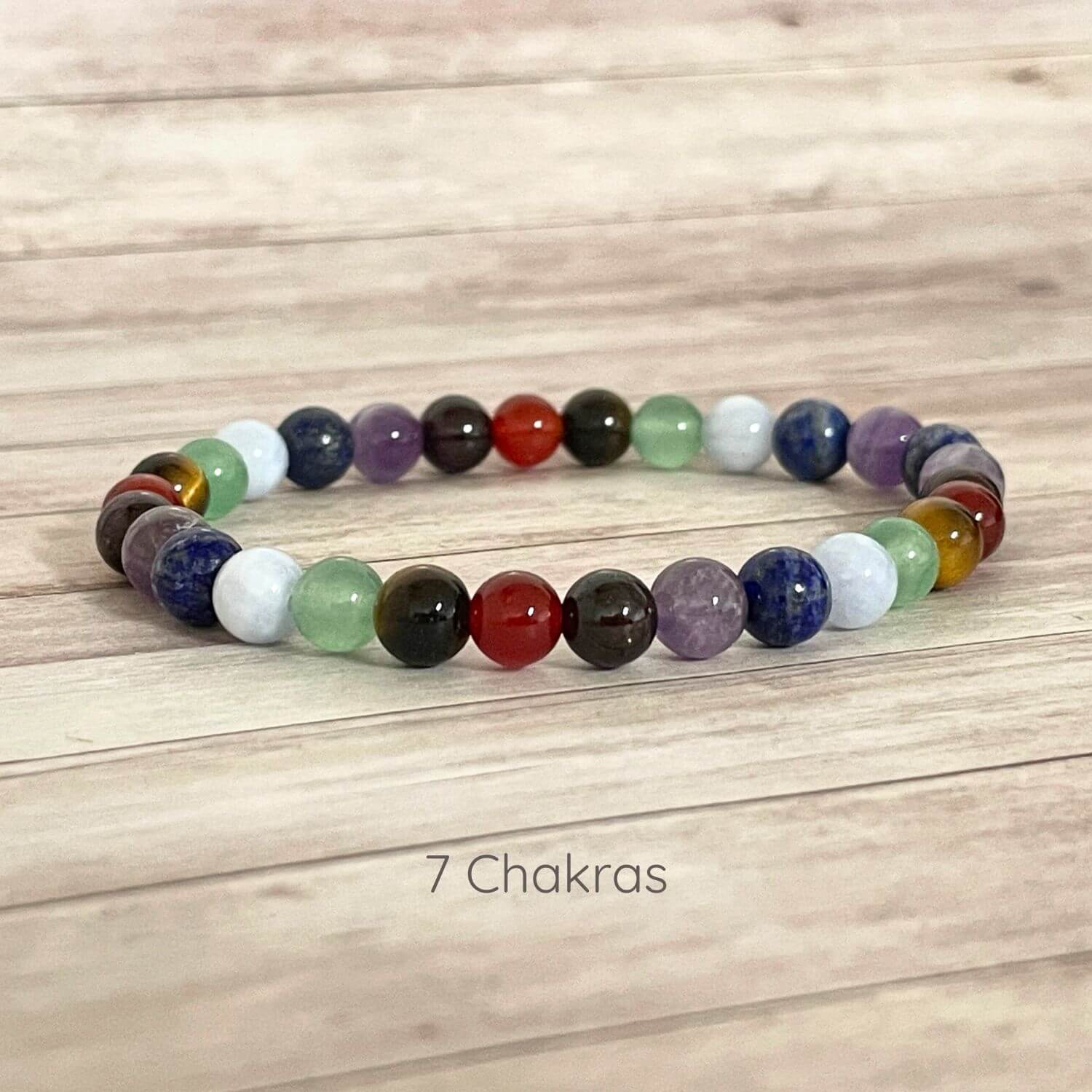 Bracelet 7 chakras en pierres naturelles 6 mm sur fil élastique, bijou bien-être