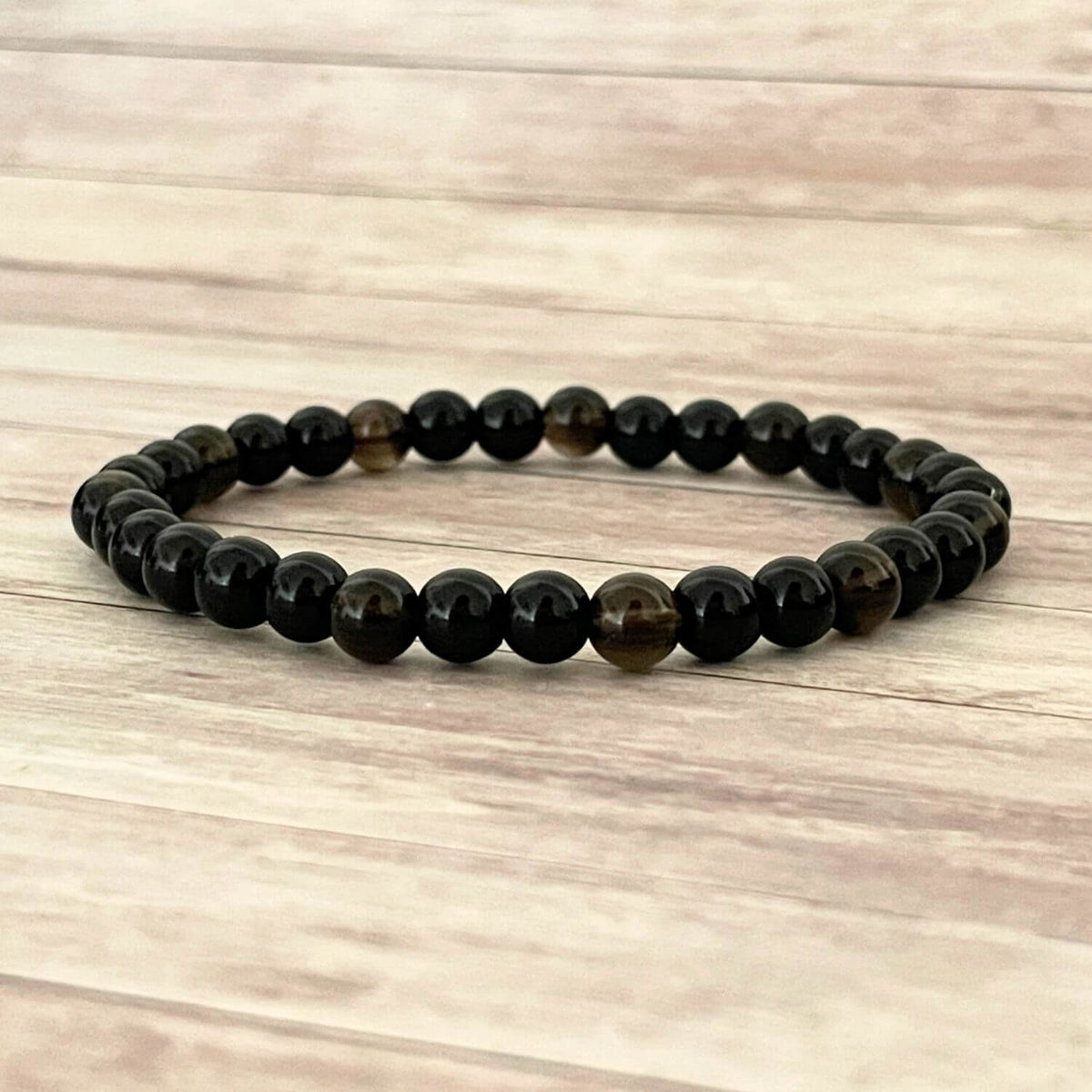 Bracelet Ancrage profond en Tourmaline Noire Quartz Fumé et Onyx sur fil élastique – vue principale