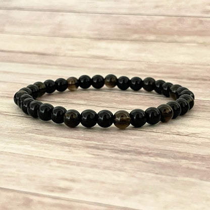 Bracelet Ancrage profond en Tourmaline Noire Quartz Fumé et Onyx sur fil élastique – vue principale