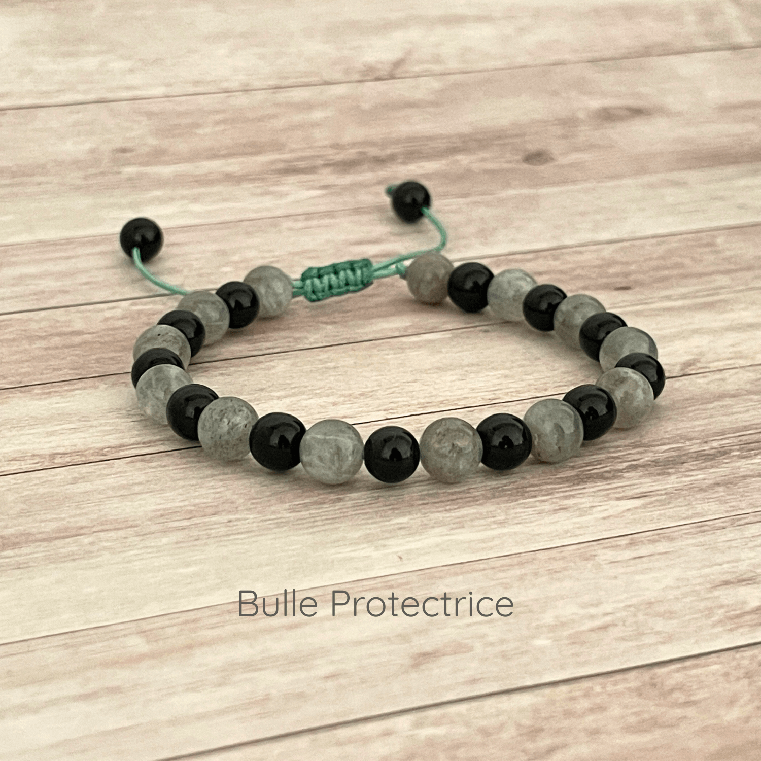 Bracelet en pierres naturelles labradorite et onyx sur cordon ajustable, vue de présentation