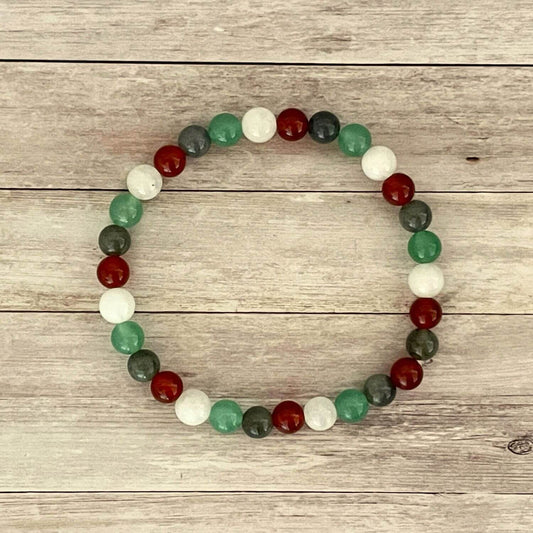 Vue de dessus du bracelet projet bébé, pierres naturelles Pierre de Lune Cornaline Jade Grenat pour désir de grossesse