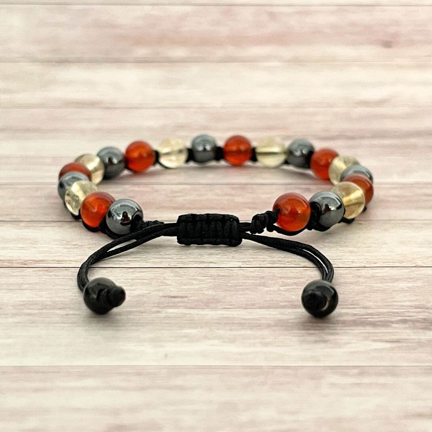 Fermeture du bracelet Élan nouveau sur cordon ajustable avec perles noires en acier inoxydable